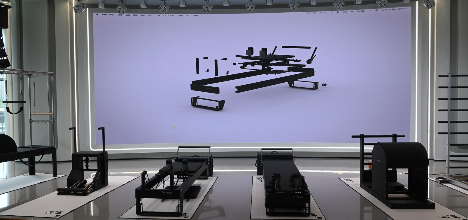 KCONE Temnox Pilates equipment line at the factory launch — studio reformer, cadillac, ladder barrel and wunda chair